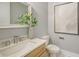 Powder room with single vanity and modern fixtures at 2492 S Milmar Dr, Sarasota, FL 34237
