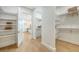 Large walk-in closet with ample shelving and hanging space at 2492 S Milmar Dr, Sarasota, FL 34237