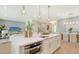 Modern kitchen with island and stainless steel appliances at 2492 S Milmar Dr, Sarasota, FL 34237