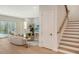 Bright living room with hardwood floors, and access to a back patio at 2492 S Milmar Dr, Sarasota, FL 34237