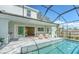 Relaxing patio with a view of the pool and house at 2492 S Milmar Dr, Sarasota, FL 34237