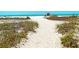 Path to beach with sandy dune landscape at 1 Benjamin Franklin Dr # 121, Sarasota, FL 34236