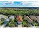 Community overview showing houses with tile roofs and a peaceful atmosphere at 11435 Fort Lauderdale Pl, Venice, FL 34293