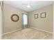 Small bedroom with window and carpet flooring at 11435 Fort Lauderdale Pl, Venice, FL 34293