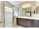 Double vanity bathroom with large shower at 11435 Fort Lauderdale Pl, Venice, FL 34293