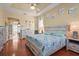 Comfortable main bedroom features a large bed with nautical themed decor and neutral furnishings at 132 Shady Pkwy, Sarasota, FL 34232