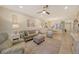 Spacious living room with ample natural light and comfortable seating at 13604 Messina Loop # 103, Lakewood Ranch, FL 34211