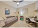 Home office with daybed, desk, and ceiling fan at 13604 Messina Loop # 103, Lakewood Ranch, FL 34211