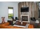 Elegant lobby with fireplace and comfortable seating area, offering a relaxing atmosphere at 13604 Messina Loop # 103, Lakewood Ranch, FL 34211