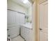 Convenient laundry room with washer, dryer, and extra storage at 13604 Messina Loop # 103, Lakewood Ranch, FL 34211