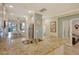 Modern kitchen with granite countertops and stainless steel appliances at 13604 Messina Loop # 103, Lakewood Ranch, FL 34211