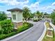 Gated community entrance with landscaping and signage at 20930 Fetterbush Pl, Venice, FL 34293