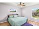 Spacious bedroom with hardwood floors and ceiling fan at 214 Patterson Ave, Osprey, FL 34229