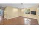 Spacious living area with hardwood floors and access to the kitchen at 214 Patterson Ave, Osprey, FL 34229