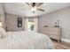 Spacious main bedroom with large dresser and access to the pool at 23095 Langdon Ave, Port Charlotte, FL 33954