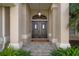 Elegant house entrance with double doors at 23095 Langdon Ave, Port Charlotte, FL 33954