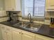 Updated kitchen with double sink, new countertops, and appliances at 3935 Lake Bayshore Dr # F-316, Bradenton, FL 34205