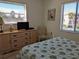 Spacious bedroom with large windows and dresser at 3935 Lake Bayshore Dr # F-316, Bradenton, FL 34205