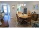 Bright dining room with wood table and chairs at 3935 Lake Bayshore Dr # F-316, Bradenton, FL 34205