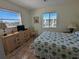 Comfortable bedroom with a dresser and views at 3935 Lake Bayshore Dr # F-316, Bradenton, FL 34205