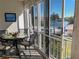 Enjoy water views from this lanai with table and chairs at 3935 Lake Bayshore Dr # F-316, Bradenton, FL 34205