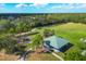 Aerial view of a park with a pavilion, playground, and open green space at 4407 67Th E St, Bradenton, FL 34203