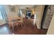 Bright dining area with wood flooring and a wooden table at 4924 Live Oak Cir # 115, Bradenton, FL 34207