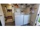 Laundry room with washer and dryer, and access to kitchen at 4924 Live Oak Cir # 115, Bradenton, FL 34207