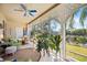 Serene sunroom, featuring a water view and ceiling fan at 6101 34Th W St # 5G, Bradenton, FL 34210