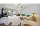 Living room with a sofa, rocking chair, and view to backyard at 6515 Heritage Ln # 2615, Bradenton, FL 34209
