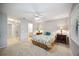Spacious bedroom with a queen bed and ensuite bathroom at 6515 Heritage Ln # 2615, Bradenton, FL 34209