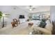 Bright living room with comfy seating and access to patio at 6515 Heritage Ln # 2615, Bradenton, FL 34209
