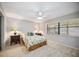 Bedroom with a queen-size bed and nightstands at 6515 Heritage Ln # 2615, Bradenton, FL 34209