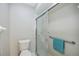 Clean bathroom with toilet, shower, and grab bars at 6515 Heritage Ln # 2615, Bradenton, FL 34209