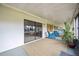 Relaxing sunroom with sliding glass doors leading to backyard at 6515 Heritage Ln # 2615, Bradenton, FL 34209