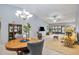 Open living room and dining area with neutral decor and patio access at 6515 Heritage Ln # 2615, Bradenton, FL 34209
