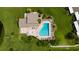 Community pool and spa with surrounding patio furniture at 6515 Heritage Ln # 2615, Bradenton, FL 34209