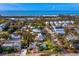 Coastal cottage with lush landscaping, near the beach at 6901 Poinsettia Ave, Longboat Key, FL 34228
