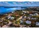 Aerial view of neighborhood by the bay at 6901 Poinsettia Ave, Longboat Key, FL 34228