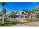 Charming bungalow with white picket fence at 6901 Poinsettia Ave, Longboat Key, FL 34228