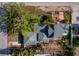 Grey-roofed home in a residential area, near trees at 6901 Poinsettia Ave, Longboat Key, FL 34228