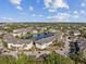 An aerial view showcasing the community and its lake at 4802 51St W St # 1701, Bradenton, FL 34210