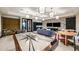 Game room with air hockey table and comfortable seating at 10128 Morning Mist Ln, Sarasota, FL 34241