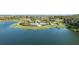 Community overview featuring a lake and resort-style amenities at 10128 Morning Mist Ln, Sarasota, FL 34241
