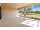 Large screened patio with backyard views at 10128 Morning Mist Ln, Sarasota, FL 34241