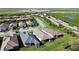 Aerial view of new homes, showcasing backyard and community features at 10128 Morning Mist Ln, Sarasota, FL 34241