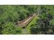 Elevated boardwalk path through lush green nature preserve at 10128 Morning Mist Ln, Sarasota, FL 34241