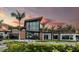 Modern clubhouse with large windows and sleek design at 10128 Morning Mist Ln, Sarasota, FL 34241