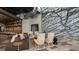 Relaxing lounge area with a climbing wall and comfortable seating at 10128 Morning Mist Ln, Sarasota, FL 34241