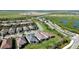 Aerial view of a new home community near conservation and recreational areas at 10128 Morning Mist Ln, Sarasota, FL 34241